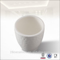 Muestra gratis al por mayor White Emboss taza de café de cerámica